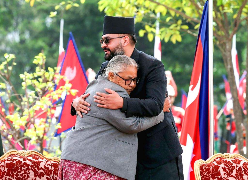 Balen Shah at oath-taking ceremony with Nepal flags